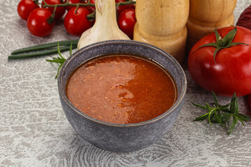 Hot tomato soup with diced chicken
