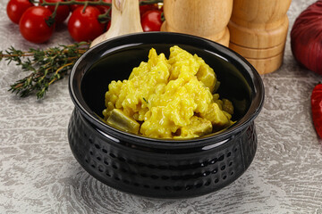 Italian cuisine - yellow risotto with chicken