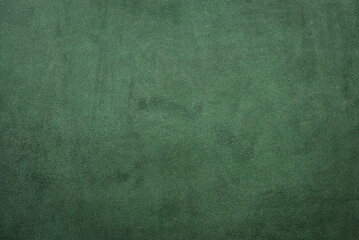 Green leather surface texture background. Top view. Flat lay.