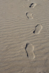 way with sand footprints