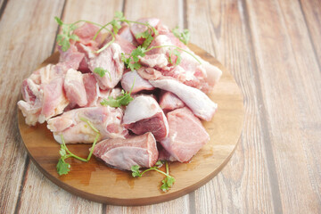 close up of raw meat on chopping board on a chopping board 