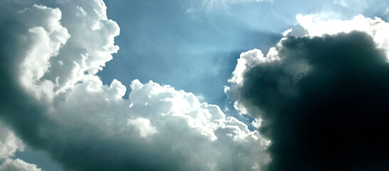 The wide view of the blue sky and thick white clouds is enchanting