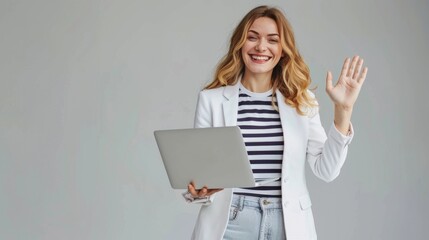 Obraz premium Smiling Woman Greeting with Laptop