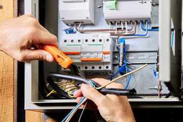 Connection of high-voltage cable to electrical board, removal of over jacket.