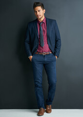 Fototapeta premium Portrait, businessman and grey background or professional, studio and formal. Confidence, corporate and man or male employee, mockup space and career or consultant, suit and isolated in fashion