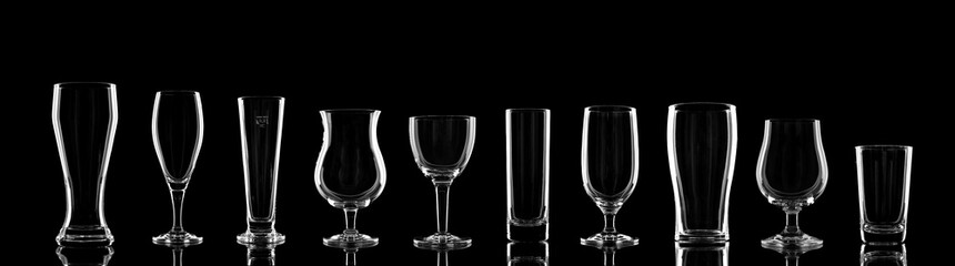 empty specific beer glasses for comparison on black background