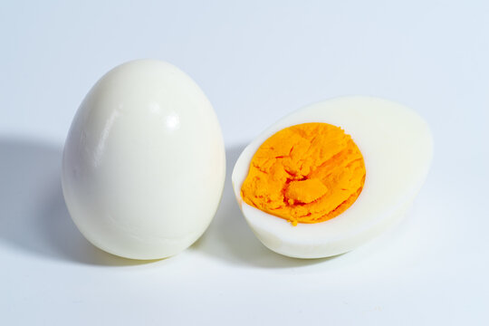 Piece of boiled egg. Isolated over white
