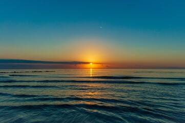 Fototapeta premium Sunrise on the sea in Italy 