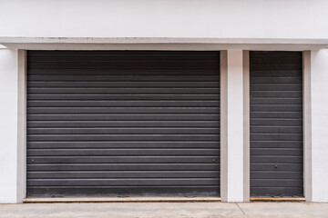 shop with shutters down. closed shop concept