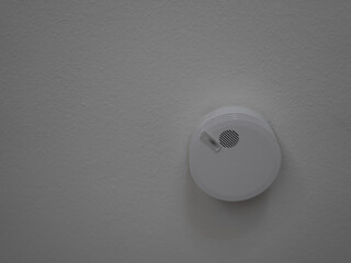 smoke detector on a ceiling