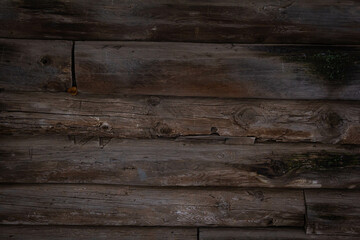 The texture of a wooden wall made of logs.