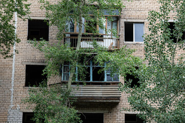 A resettled abandoned apartment building in the city center.