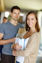 Students, books and portrait on campus with team for meeting, university and education or school. Man, paperwork and woman at college with textbook for research, discussion and learning or study