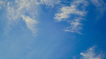 The atmosphere on a clear day with a blue sky, rows of clouds that look like thin cotton. Natural...