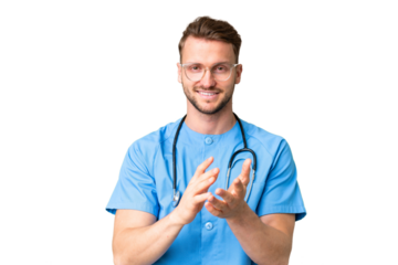 Young nurse man over isolated chroma key background applauding after presentation in a conference