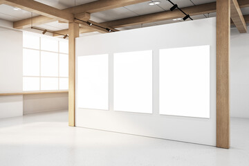 Obraz premium Three blank white posters in a gallery setting with wooden beams, a clean, modern appearance on a light background, concept of exhibition space. 3D Rendering