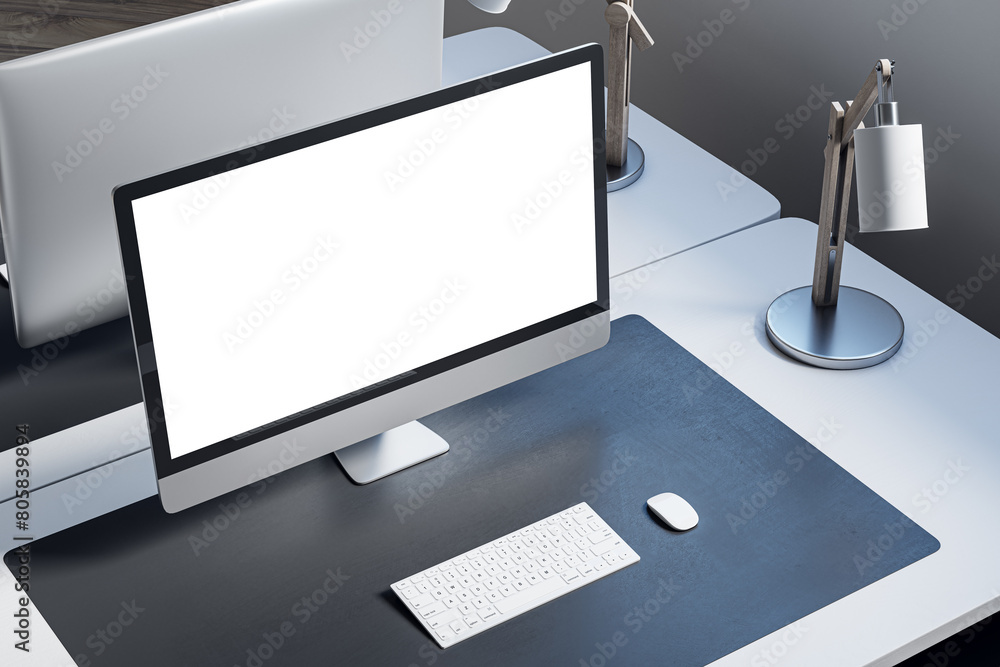 Poster Close up and above view of designer office desktop with mock up computer display on white desk, rug, lamp and other items. Mock up, 3D Rendering.