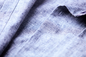 Close up of men's linen shirt. Soft focus.