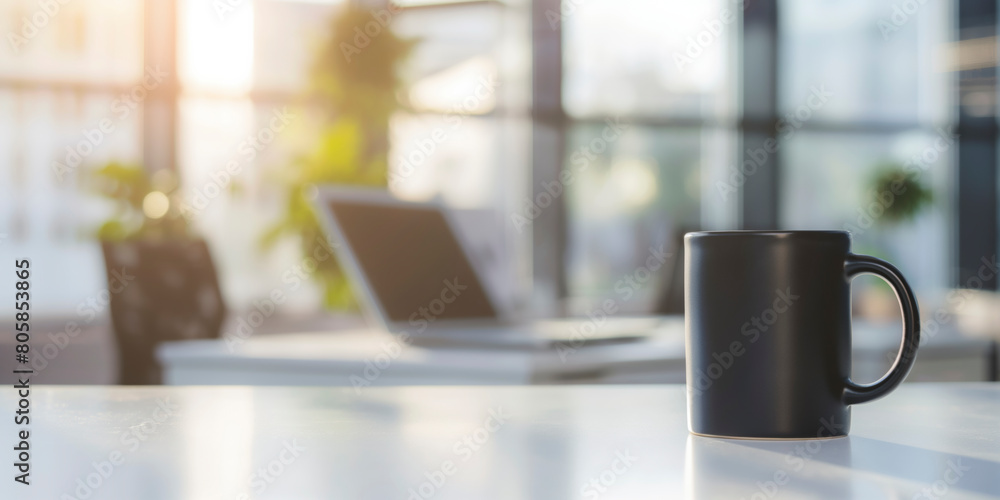 Aufkleber banner, a black coffee mug sits on a table in front of a laptop. the scene is set in a modern office