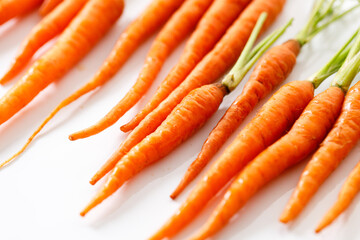 Fresh and sweet ripe orange carrot on white background