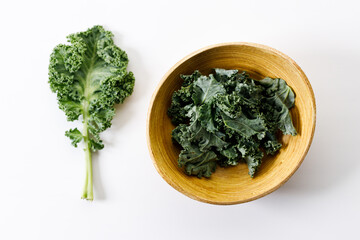 Fresh green Kale leaf salad vegetable on white background