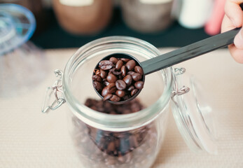 Coffee beans roasted naturally in an  glass.