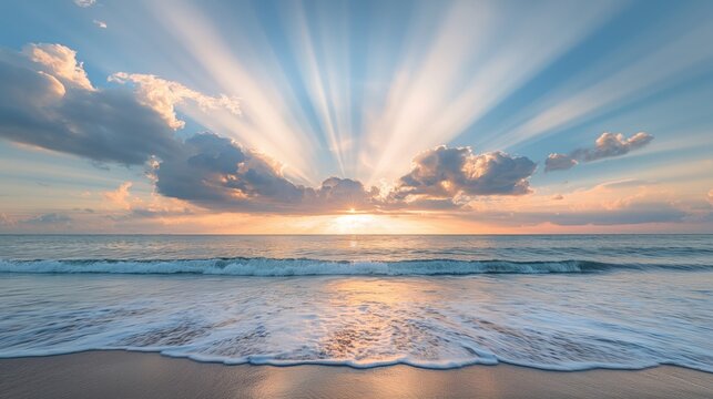 Dramatic Sunrise with Radiant Sunbeams Over the Ocean