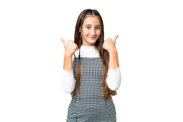 Young girl over isolated chroma key background with thumbs up gesture and smiling