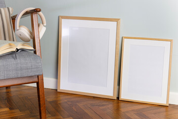 Home interior blank picture frames mockup, room in light pastel colors, Scandinavian style interior...