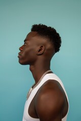 Obraz premium Confident Young Black Man with Modern Hairstyle in White Tank Top