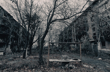 destroyed and burned houses in the city during the war in Ukraine