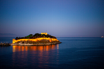 Kusadasi castle at evening with lights up Turkey