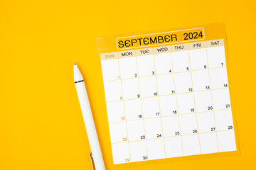 September 2024 Monthly calendar for 2024 year with pen on yellow