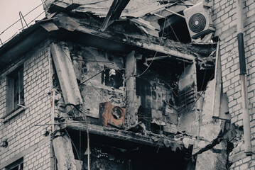 destroyed and burned houses in the city during the war in Ukraine