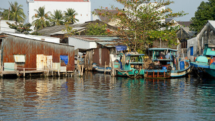 Fototapeta na wymiar colorful fisherman ships in the harbor of phu quoc