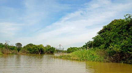 fisherman boat on the tonle sap river in cambodia