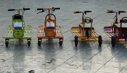 mini bikes for children at phu quoc harbor promenade