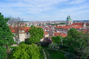 Cityscape of old town of Prague and Lesser town district taken from the hill over the Vltava river taken in the spring sunny day. Downtown of capitol city of Czech Republic popular place for tourists.