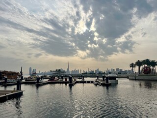 Modern city harbor with buildings and skyscrapers silhouette background