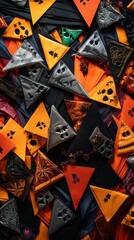 A collection of black, orange, and silver Halloween decorations