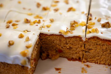 Vegan carrot cake with walnotes in pieces