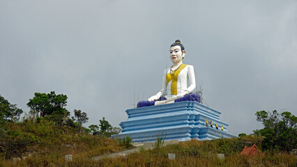 huge buddha statue in bokor hills national park