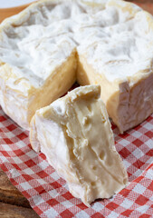 French soft Camembert cheese, original Camembert de Normandie, with white mold