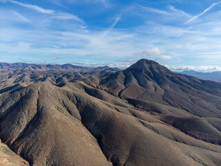 Panoramic view on colourful remote basal hills and mountains of Massif of Betancuria as seen from...