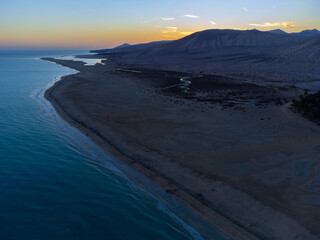 Aerial view on sandy dunes and turquoise water of Sotavento beach, Costa Calma, Fuerteventura, Canary islands, Spain in winter