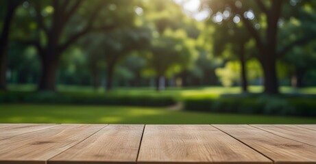 Empty wooden table top with blurred green nature garden background for product placement. Product background