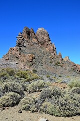 Scenic view of volcanic rock formations in desert during sunny day, Teide National Park, Tenerife