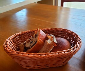 Close up of fresh raisins bread in the basket for lunch at the restaurant 