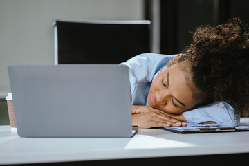 businesswoman works at office until her body is tired, she is drowsy during the daytime. female...