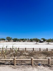 Fototapeta premium empty parking in the desert, summer, blue clear sky